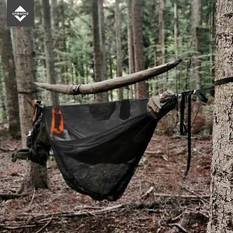 Suspended hammock with Snakeskin Tarp Sleeve 12ft Camping Rain Fly Storage Kit in forest setting, OD Green, 6ft pack of two.