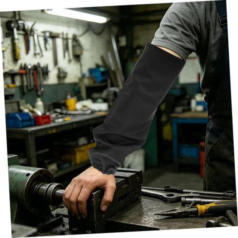 Heavy Duty Welding Arm Sleeves Heat Resistant Cotton Forearm Guards Breathable Elastic Fit Sleeve Set For Mechanics And Metalworkers in workshop.