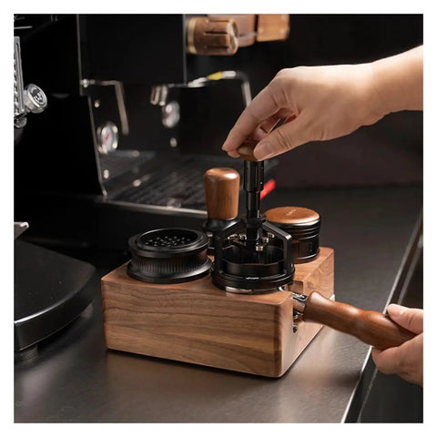 Premium Walnut Espresso Tamper Station With Integrated Powder Scaler And Crumb Bin Universal Portafilter Rest for brewing on countertop.
