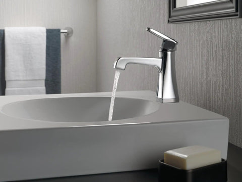 Ashlyn Single Hole Bathroom Faucet Chrome Finish With Diamond Seal Technology installed on modern sink with water flow