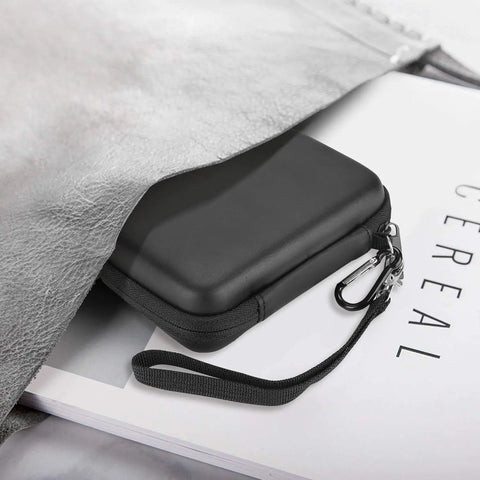 Durable 2.5 Inch External Hard Drive Case For Most Portable HDD And SSDs Fits USB 3.0 Travel Carrying Case Black on table