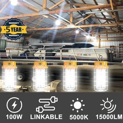 Beefed Up 100W LED Work Light With 15,000 Lumens, Replaces 400W HID HPS, linkable hanging in a warehouse with boat