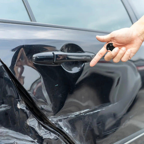 Heavy Duty Auto Dent Puller Kit Includes Nine Nylon Threaded Rod Tips For Quick Hail Fixing And Easy Door Ding Repairs that smoothens a dented car door.