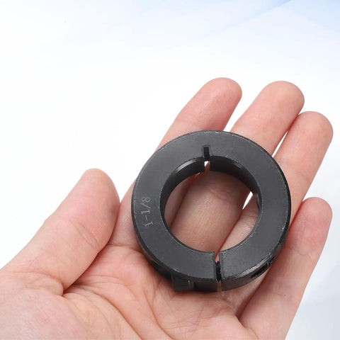 Two Piece Single Split Shaft Collar One And One Eighth Inch Bore One And Seven Eighths Inch Outer Diameter Half Inch Thick Black Oxide Lock Collar With Set Screws 1045 Steel Heavy Duty Clamping Collar For Machinery held in hand