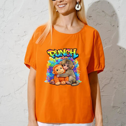 Woman wearing orange t-shirt with Six Pack Monkey Punch DTF Transfers For Tees Dope Heat Press Stickers 7x7 Inches Washable Iron On Vinyl Decals
