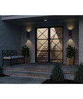 Dope Modern 5 Inch Outdoor Up And Down Wall Lantern In Black Finish Cylinder Collection Exterior Light illuminating entryway at night