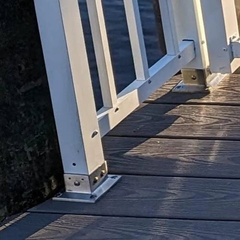 Heavy Duty Stainless Steel Fence Post Anchor Base And Pergola Support Bracket 2 Pack on wooden deck, showing installation details.