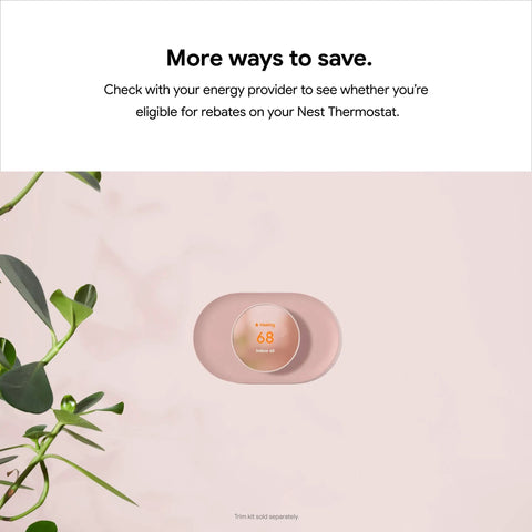 Nest Thermostat Smart Programmable WiFi Thermostat With Energy Star Certification on wall showing temperature in charcoal finish