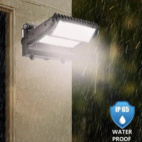 Beefed Up 100W Rotatable LED Wall Pack With Dusk To Dawn Sensor, mounted outdoors in rain, showing 270 Degree Adjustable Panel.
