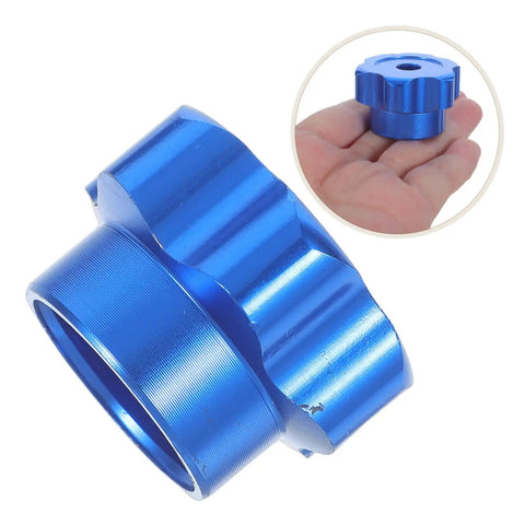 Blue Alloy Valve Stem Knob With 6mm Hole Replacement for outdoor water spigot handle shown in hand for size reference.