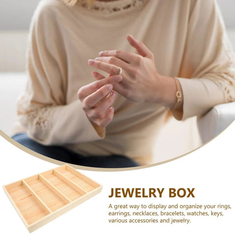 Premium Straight Up Solid Natural Wood Jewelry Tray With Four Roomy Compartments Smooth Ring Display Plate on a table with hands.