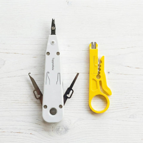 Pro Grade Impact Punch Down Tool And Integrated Wire Stripper RJ45 Crimping Kit For Cat6 Cat5e Ethernet Cables on white background.