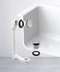 Built Tough Sch 40 Pvc Bath Waste And Overflow Assembly With Slick Illusionary Faceplate And Ada Compliant Toe Touch Drain Plug Polished Chrome installed in bathtub.