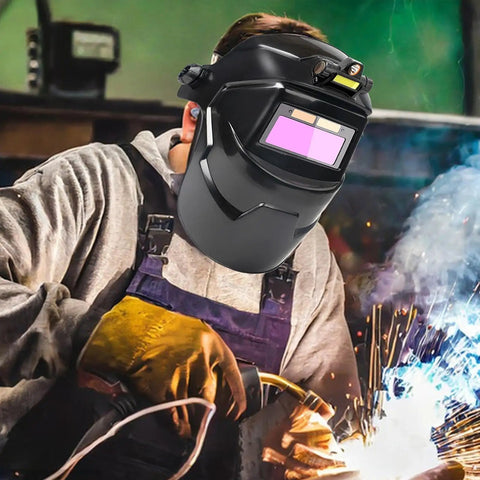 Welder using Auto Darkening Welding Hood With True Color Viewing System And Large Window For On Site Metalworking