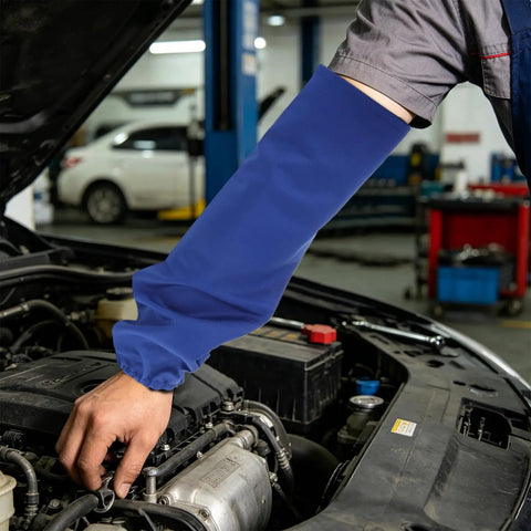 Tough As Nails Heat Resistant Welding Sleeves Fireproof Arm Protectors Zero Sweat Breathable Wrap Pro Grade Armor For Scorching Shop Grind And Heavy Auto Repair Blue on a mechanic's arm while working on an engine.