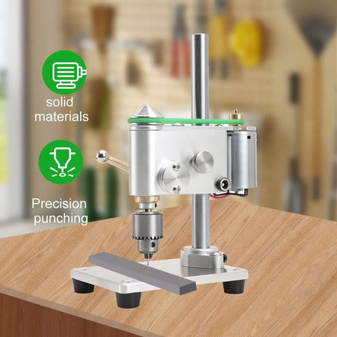 Compact Mini Drill Press Portable Bench Top Electric Tool For Metal Wood Jewelry Diy Crafts Precision Drilling Up To 4500Rpm on a wooden surface.