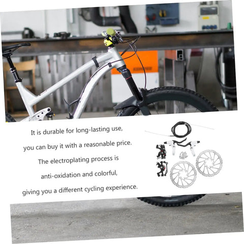 Heavy Duty CNC Machined Disc Brake Set For Mountain And Road Bikes Boasting Hollow Draining Design on a silver bike frame.