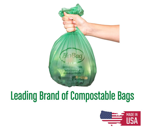Heavy Duty Compostable Food Scrap Bags 100 Count Bpi Certified Biodegradable Kitchen Counter Liners Zero Hassle Home Compost Trash Slick Eco Friendly Pack With Tough Edges held in hand.