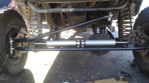 Installed 1/2 Heim Joints Rod End Kit with Right and Left Hand Threads showing suspension setup on vehicle undercarriage.