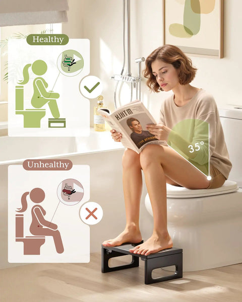 Woman using 7 Inch Folding Toilet Stool for Adults Bamboo Rustic Brown, demonstrating bathroom comfort with anti-slip strip.