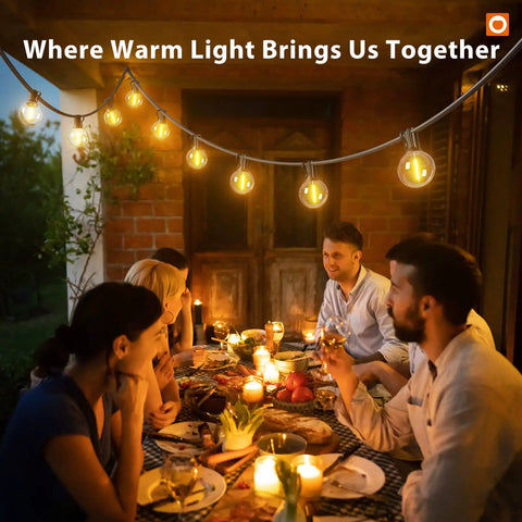 Group dining under 100Ft Outdoor String Lights G40 with Remote 54 LED shatterproof bulbs dimmable, cozy warm light on patio