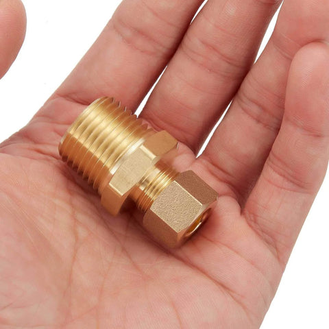 Close-up of brass compression tube fitting connector, straight coupling, 3/8 in tube OD x 1/2 in NPT male