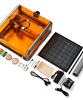 40W Laser Engraver With Acrylic Enclosure Air Assist Pump Honeycomb Bed Built In Camera And Safety Class 1 All In One Laser Engraving Machine Delivers Crazy Fast 40000 Millimeters Per Minute Speed For Wood Plastic Leather Metal Projects shown with accessories and materials