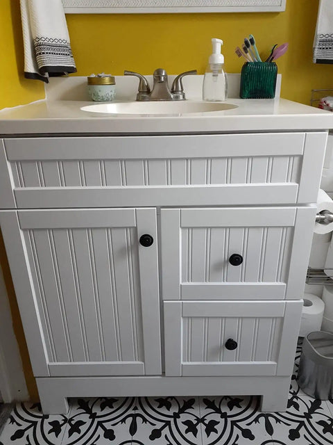Bathroom vanity with white panel doors, featuring Six Piece Set Black Vintage Flower Cabinet Drawer Knobs With Floral Embossing 1.38 Inch Wide For Dresser Cupboard Wardrobe Furniture Includes Two Screw Sizes 25mm And 38mm For A Quick Install.