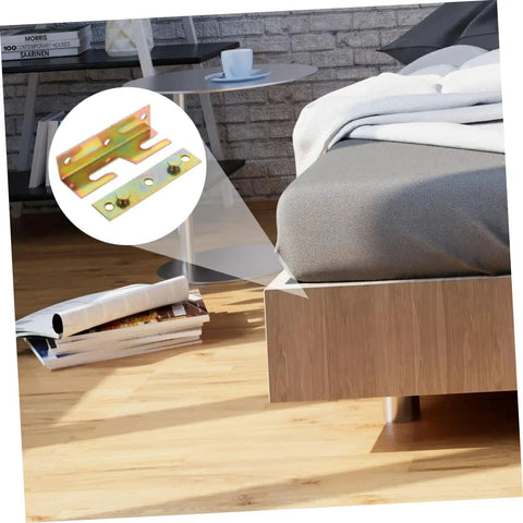 Upgrade Your Sleep Game With This Heavy Duty 16 Piece Bed Frame Hardware Kit featuring a close-up of a bed rail bracket on a bed.