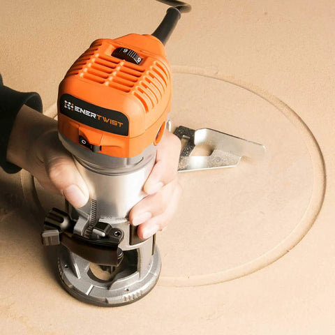 Person using Compact Router Tool With 7.0 Amp Motor Soft Start And Variable Speed From 10,000 To 32,000 RPM for woodworking