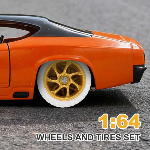 Close-up of a car with gold seven-spoke wheels in white rims, part of the Four Pack One Sixty Fourth Scale Wheels And Tires Set