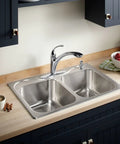Forté Single-Hole Kitchen Faucet with 9-1/16 Inch Spout, Polished Chrome, installed on a double sink.