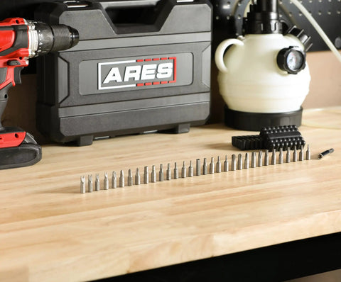 Security Bit Set With Magnetic Extension Bit Holder For Fast Tamper Resistant Fasteners, 33-Piece Kit on workbench