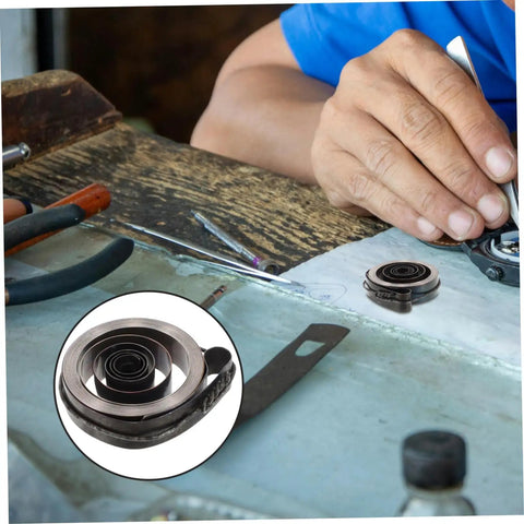 Craftsman using Vintage Mechanical Alarm Clock Repair Kit With Precision Steel Parts And Winding Key on wooden workbench