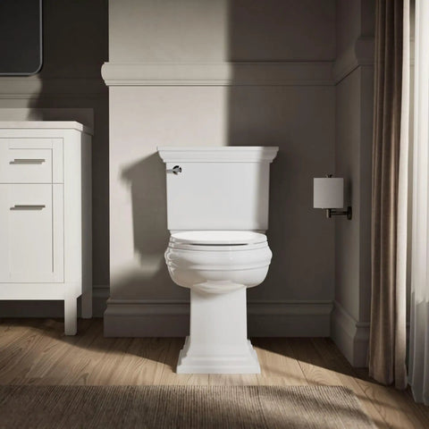 Revamp Your Bathroom With This Top Tier Quiet Close Elongated Toilet Seat In Crisp White featuring sturdy mounting bolts in a bathroom.