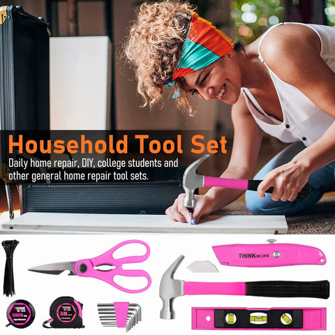 Woman using a hammer from the pink 207 piece womens tool set with portable 13 inch wide mouth tool bag for DIY home repair.
