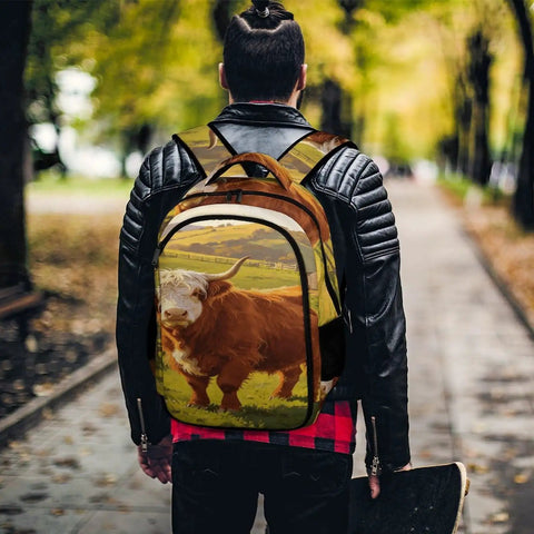 Person wearing White Face Highland Cattle Pasture Print Backpack for Everyday Use, unisex polyester daypack.