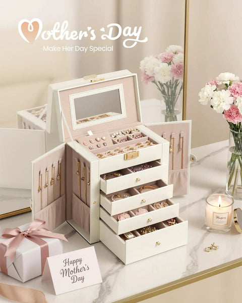5-Tier Jewelry Box Organizer With 4 Drawers Lockable Mirrored Case Cream White displayed with jewelry on a dressing table