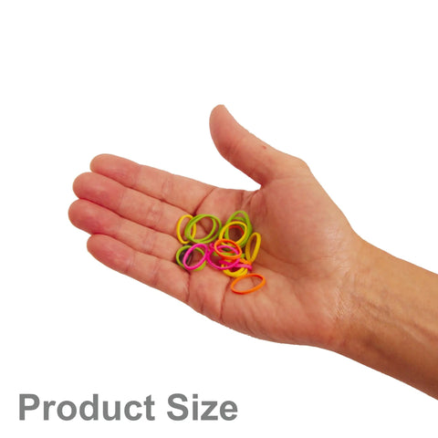 Dope Half Inch Rainbow Mix Small Rubber Bands For Hair Pack 500 Count held in a hand illustrating product size and grip.