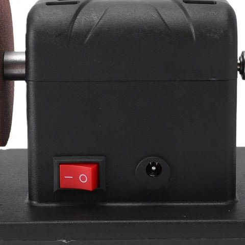 Cordless Mini Bench Grinder With 3 Inch Wheel And Variable Speed Shifting From 2000 To 6000 Rpm power switch with copper motor detail.