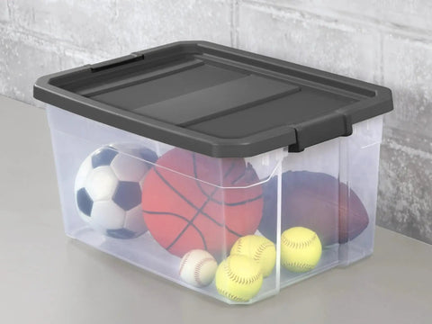 2 Pack 76 Quart Clear Stackable Storage Bins With No Fuss Latch Lids And Dark Gray Covers showing sports balls inside for organization.