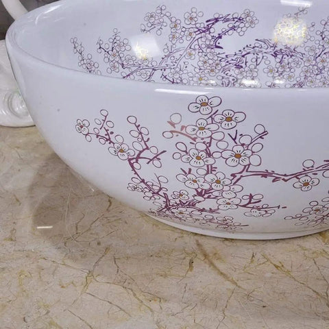 Top Shelf Above Counter Vessel Sink For Modern Bathroom Vanity High Gloss Art Porcelain Wash Basin Built Tough Ceramic Craftsmanship And No Sweat Install 40X15 Cm Slick Finish with floral design.