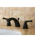 Magellan Mini Widespread Bathroom Faucet With Pop Up Drain Solid Brass Construction Deck Mount on marble sink