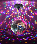 Rechargeable Disco Ball Spinner With Remote Control, Adjustable Speed, 18 RGBW LEDs, 4000mAh Battery in action spreading lights
