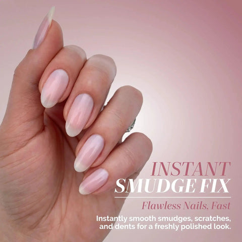 Hand with flawless nails demonstrating Instant Smudge Fix For Nails Smooths Dents And Imperfections Quick Dry Top Coat Booster.