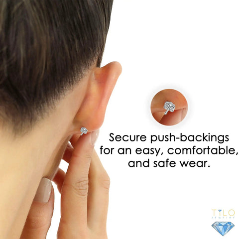 Shiny 14k White Gold Ball Stud Earrings With Secure Butterfly Pushbacks, 4mm Classic Round Studs, High Polish Finish, Everyday Sparkle Jewelry For Ears, Hypoallergenic Post And Backing. Back view on ear, secure push-back shown.