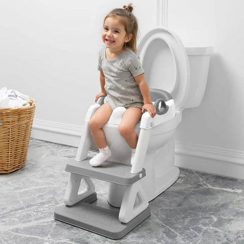 Super Secure Toddler Potty Ladder And Training Seat With Memory Foam Cushion Non Slip Base Fits All Standard Toilets No Sweat Setup Routine Kid Approved Gear For Boys And Girls, toddler sitting on potty ladder.
