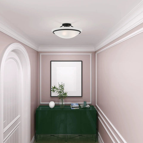 Newburgh 3 Light Ceiling Mount in black finish with alabaster shade illuminating a modern hallway