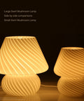 Large and small Swirl Mushroom Lamp with Vintage Striped Murano Glass, soft warm white LED night light comparison in dark setting.