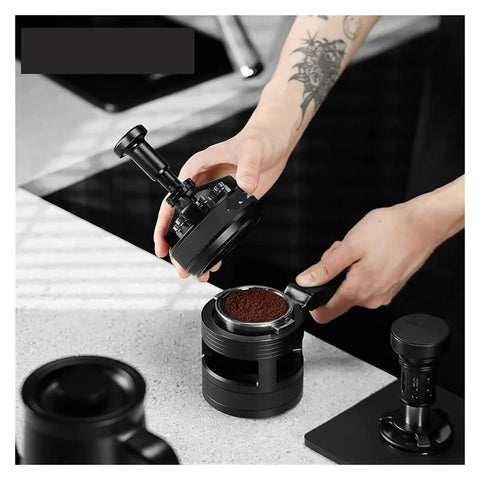 Level Up Your Home Barista Setup With This Dope 58Mm Espresso WDT Tool Featuring Six Heat Resistant Needles Adjustable Depth Control And Hidden Magnetic Storage For Zero Fuss Morning Routines, hands using the tool on a portafilter.